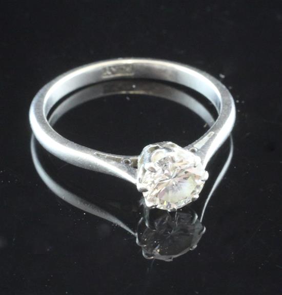 A platinum and solitaire diamond ring, size L.